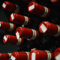 Premium wine bottles stored in a curated wine cellar collection.
