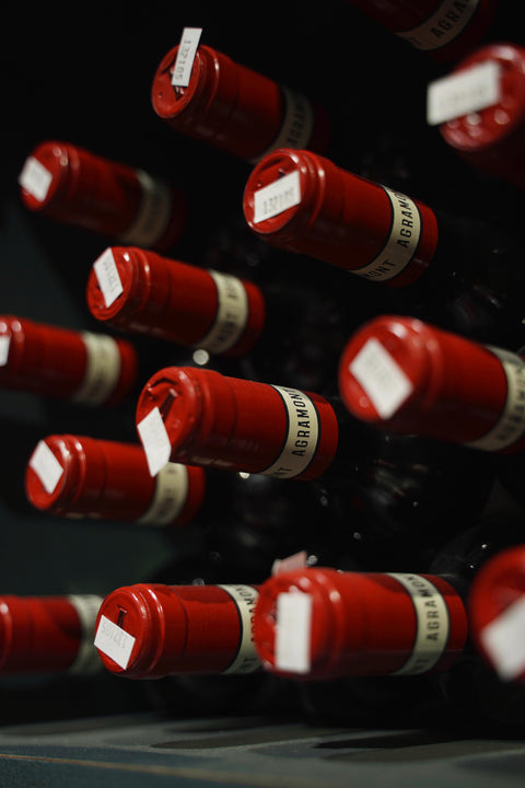 Premium wine bottles stored in a curated wine cellar collection.